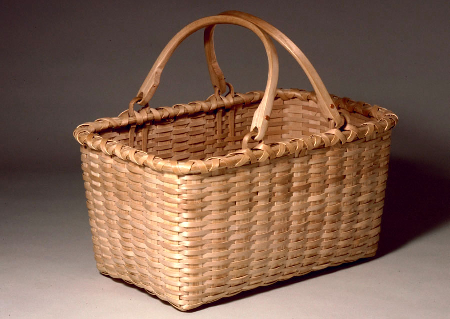 Double Swing Handle Market Basket - rectangular market basket with two bent loop swing handles. Two ash runners are fastened with oval head copper rivets. Hand crafted of brown ash by Maine basket maker Stephen Zeh.