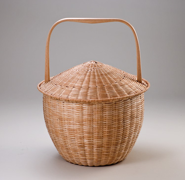 Feather Basket - handcrafted of brown ash by Stephen Zeh, Maine basketmaker.