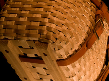 Trout Creel - detail of runners. A fishing creel basket handcrafted of brown ash and leather by Stephen Zeh