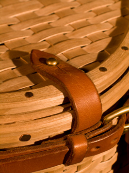 Latch detail of Trout Creel, a fishing creel basket handcrafted of brown ash and leather by Stephen Zeh