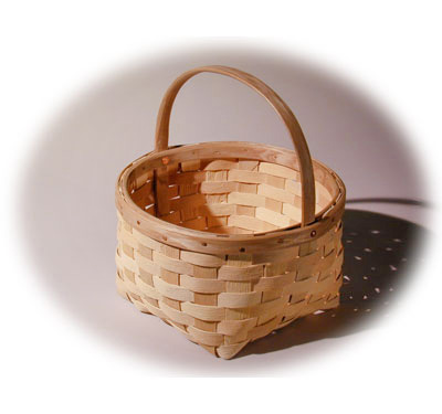 Harvest Basket -  square bottom to round top basket. The brown ash splint has the natural texture. The rims are hand split and carved with cut copper clench nails. This basket is hand woven of brown ash (black ash) by Stephen Zeh, Maine basket maker.