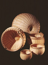 Nesting Set of Five Swing Handle Baskets  in brown ash, brass by Stephen Zeh