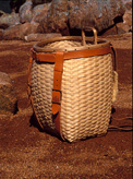 Maine Packbasket 16 inch height hand crafted by Stephen Zeh of brown ash and leather