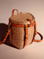 Maine Packbasket Purse hand woven in brown ash with hand sewn leather work.