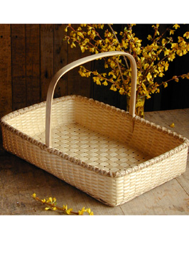 Sweetgrass Flower Tray with forsythia hand crafted of brown (black) ash and sweet grass by Stephen Zeh basket maker of Temple, Maine.