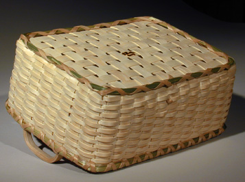 Bottom View of Sweetgrass Notecard Tray showing sweet grass footer that protects bottom of basket. Hand crafted of brown ash and sweetgrass by Stephen Zeh basket maker of Temple, Maine.